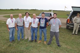 Medal Winners:  (L-R) RIck Kraft, Ron DePue, Kevin Fire, Don Gronlie, Ryan Karrar, Wytt Gonzales with Tom Rieten, Match Director on the far right.