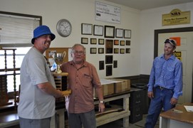 Denny Coulter, club President (R) presenting the William Coulter Standing Trophy to Morgan Diedrich (L)