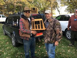 Garald Gillies, winner of the F Class Open Category for shooting a 597 our of 600 with 36 "X's". Award presented by Cody Daglish.